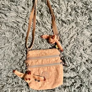Kipling Small Tan Cross- Body Bag. Extra Monkey Keychain Included.